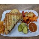 BLACKBERRY DIJON AND BRIE CHICKEN PANINI* (OUR GUESTS FAVORITE!)